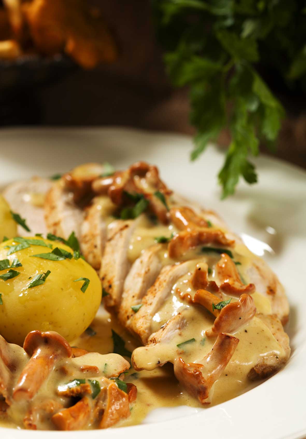 Pheasant in almond sauce with mushrooms and potatoes